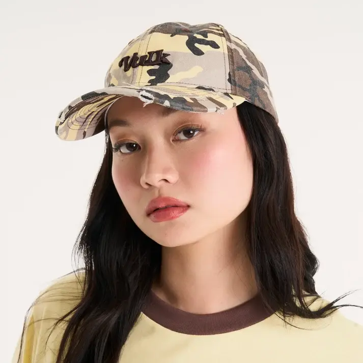 SURVIVORCAP_1_e9a20624-2c72-4de9-8294-d9568189322e.webp